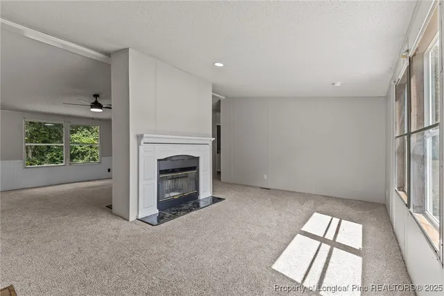 a kitchen with stainless steel appliances a refrigerator sink and microwave