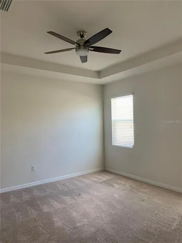 a view of a window in an empty room