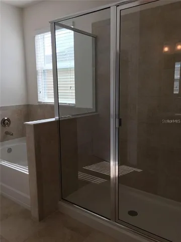 a bathroom with a bathtub