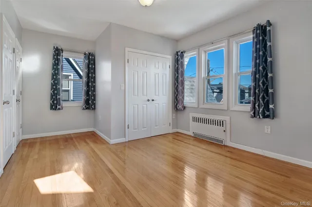 a bathroom with a shower and a tub