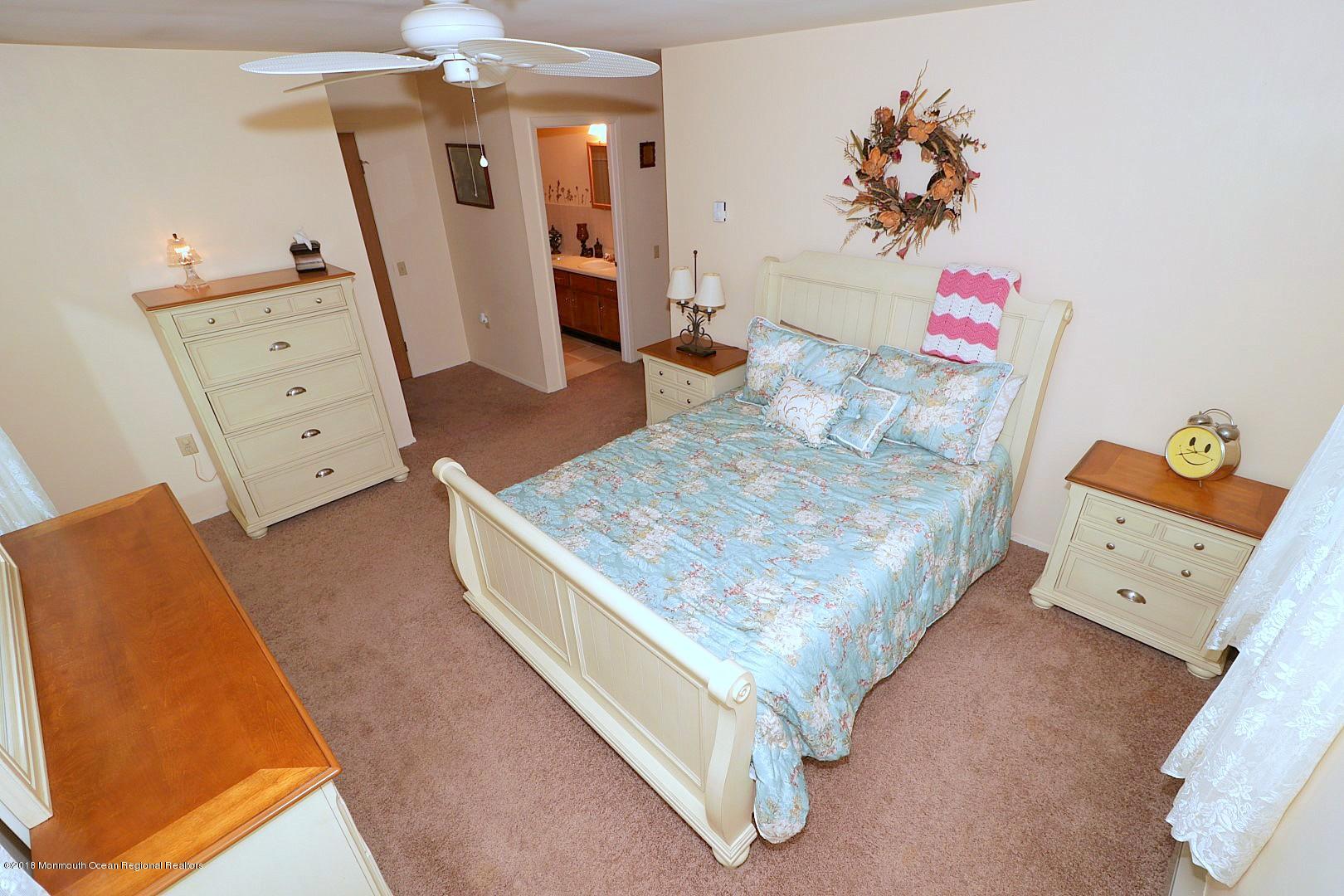 34 B Mill Road Whiting, NJ 08759 - Photo 12 of 22 a living room with furniture and a flat screen tv