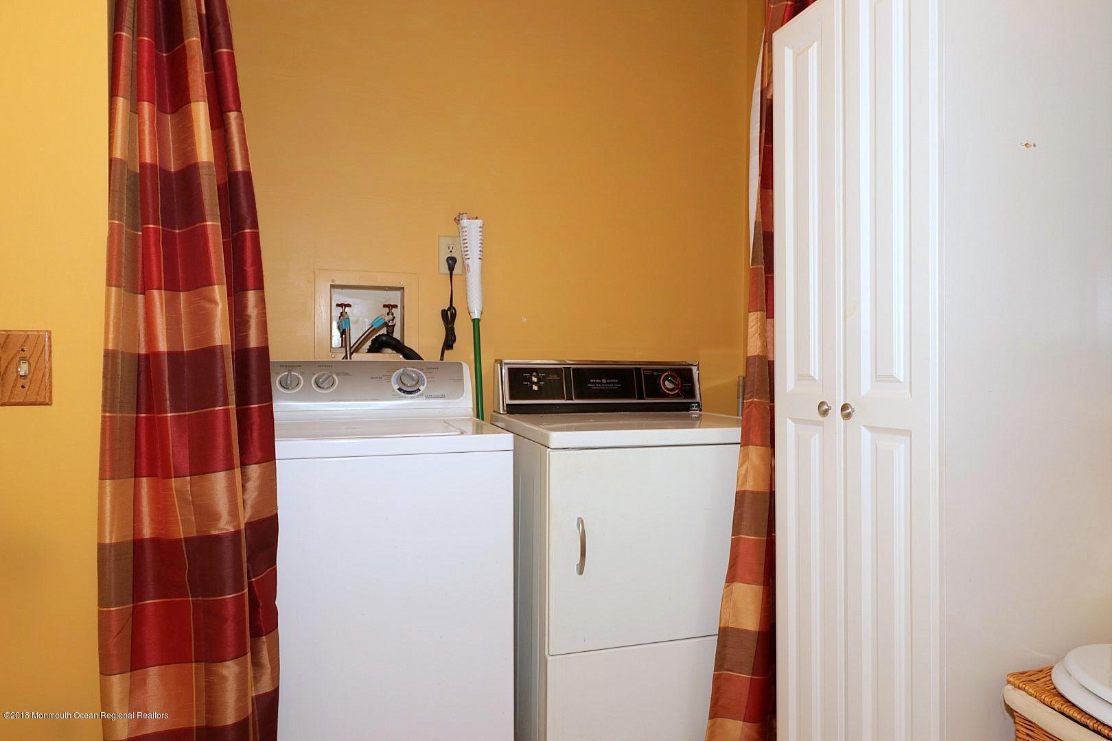 34 B Mill Road Whiting, NJ 08759 - Photo 18 of 22 a utility room with dryer and washer