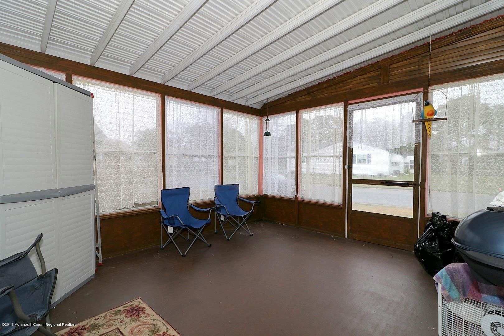 34 B Mill Road Whiting, NJ 08759 - Photo 21 of 22 a room with furniture and large windows