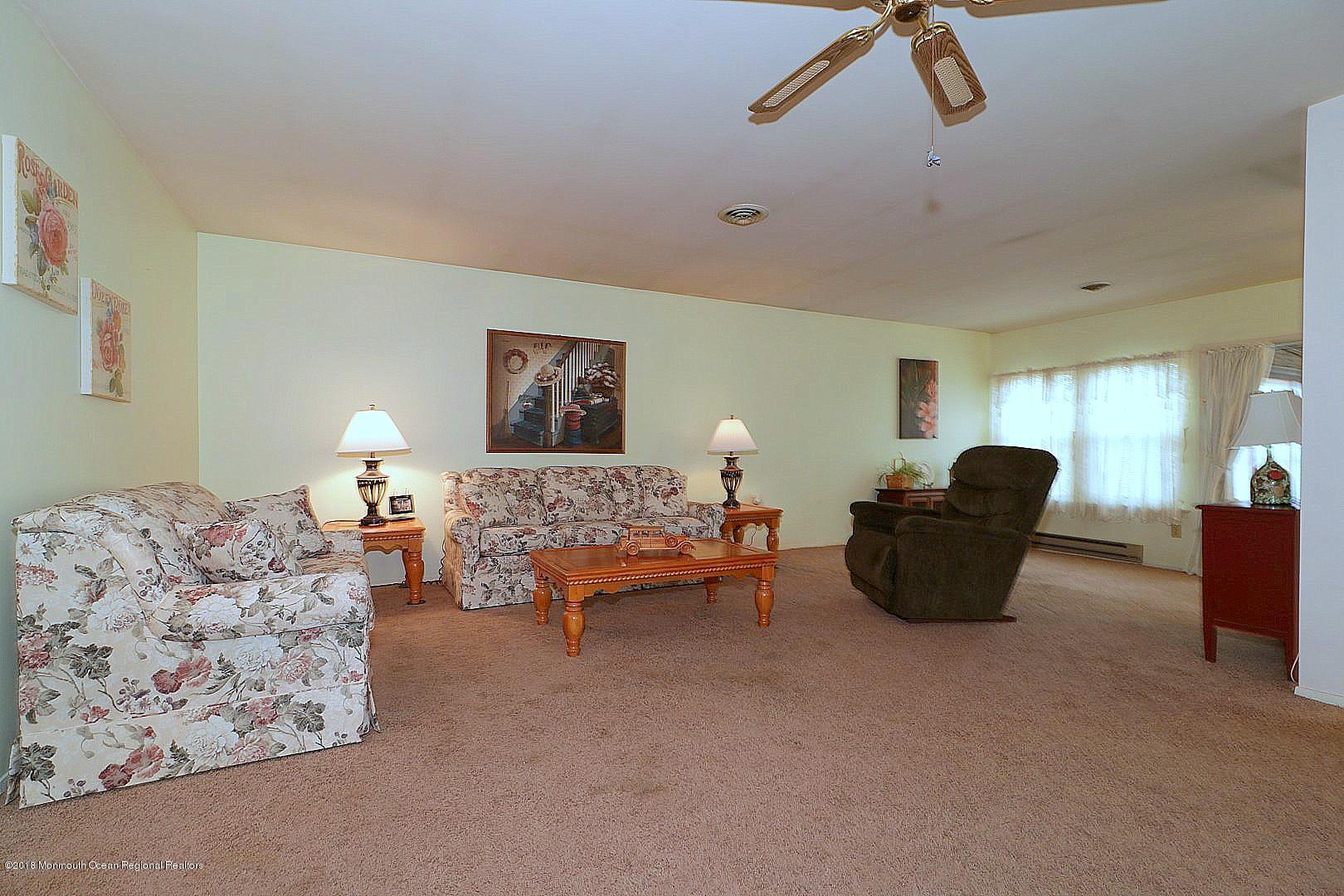 34 B Mill Road Whiting, NJ 08759 - Photo 5 of 22 a living room with furniture a lamp and a couch