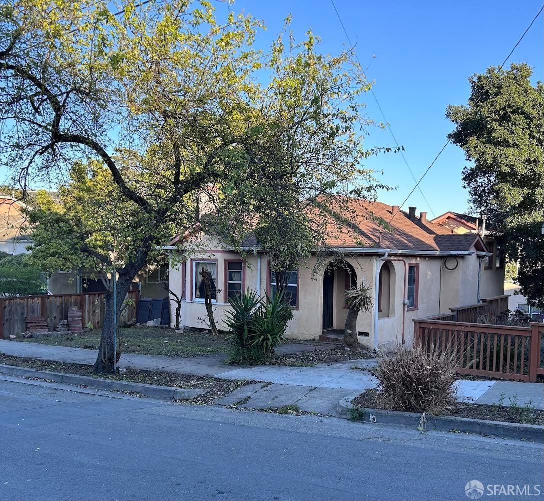 Rawson Street Oakland, CA 94619 - Photo 2 of 10 a front view of a house with garden