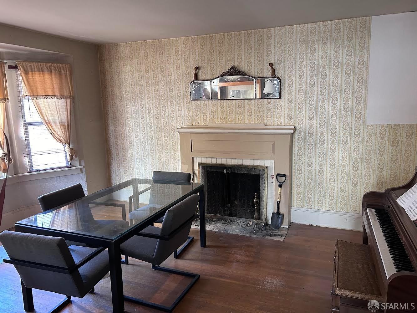 Rawson Street Oakland, CA 94619 - Photo 5 of 10 a living room with furniture and a fireplace