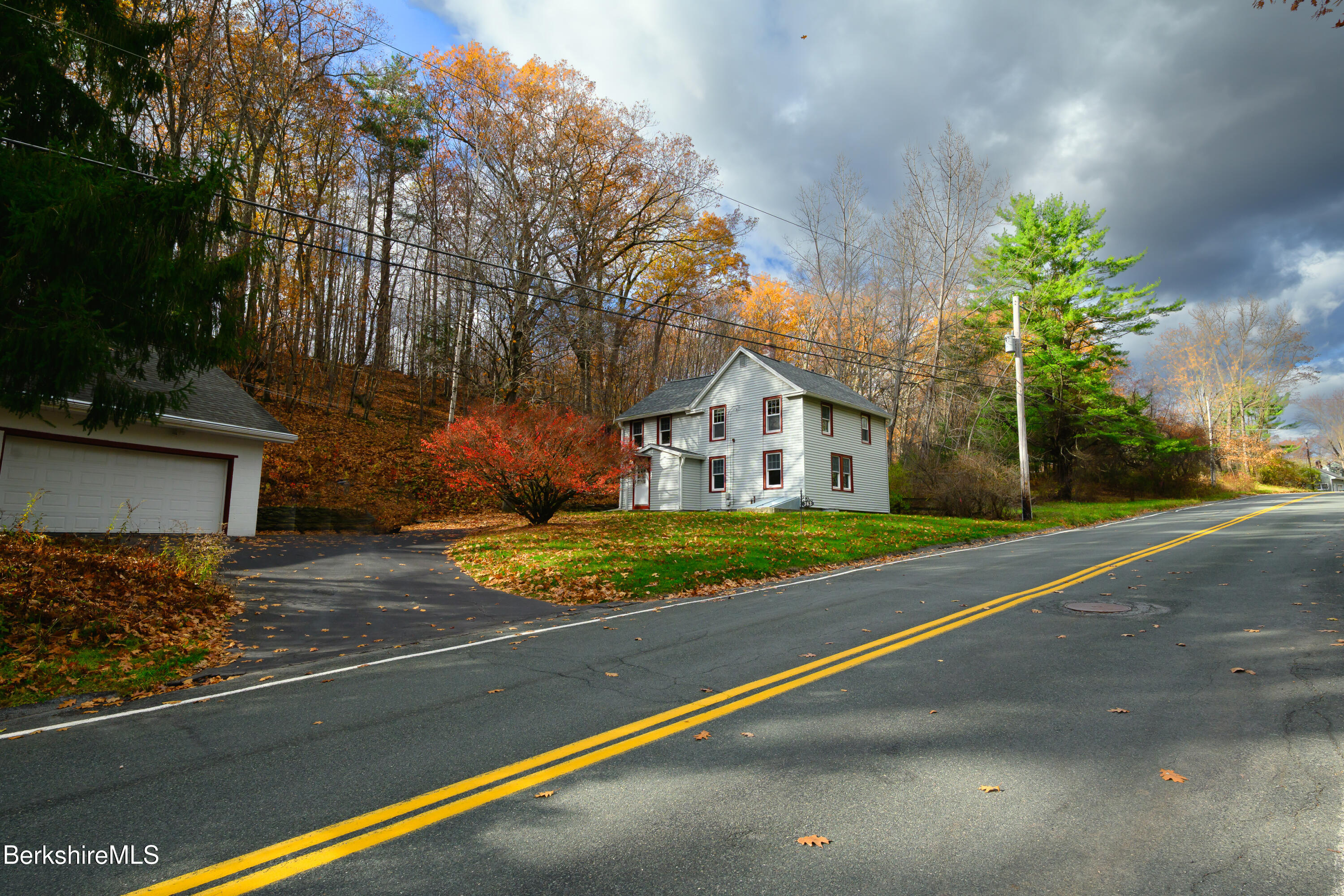 a view of a house with a street