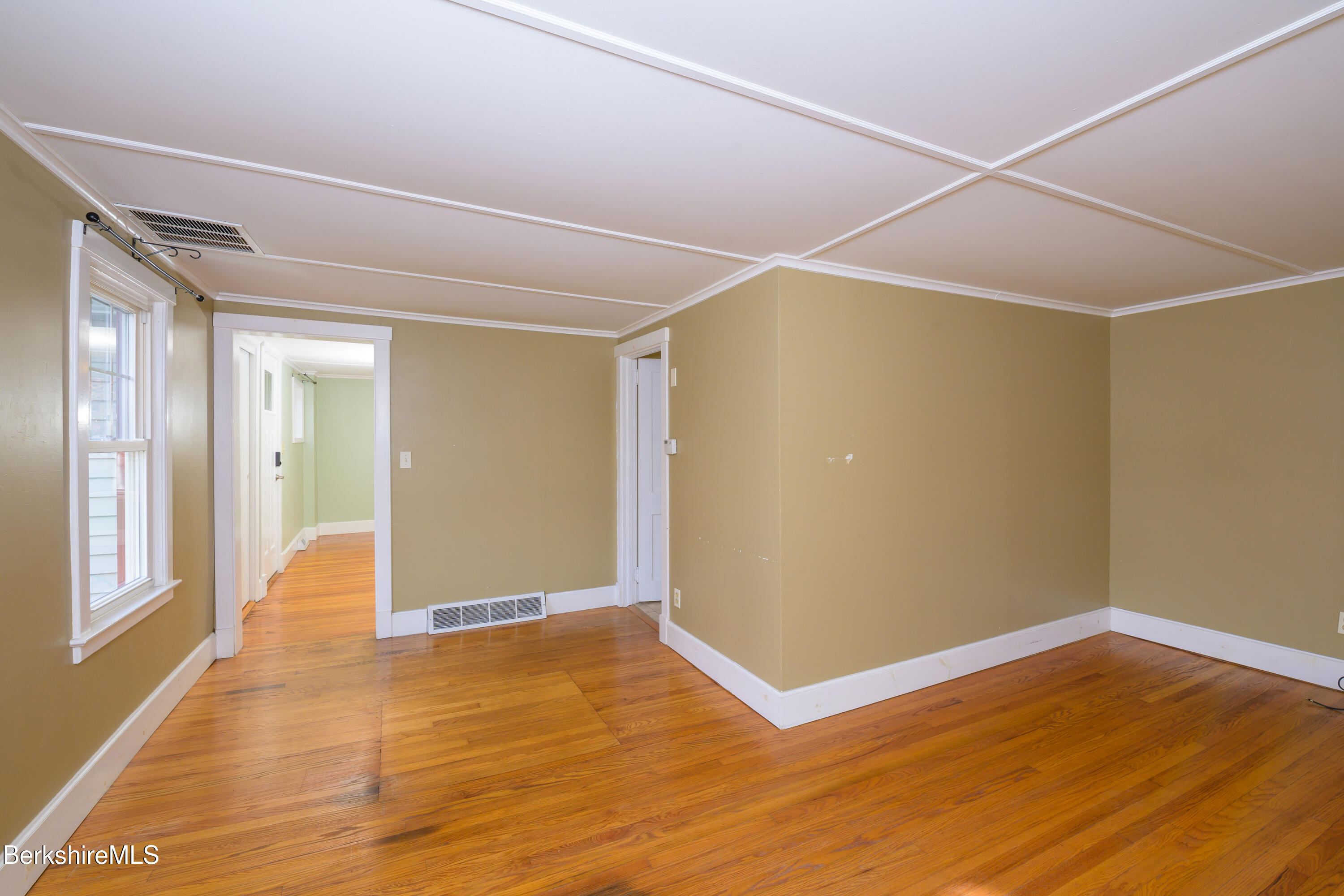 363 Henderson Road Williamstown, MA 01267 - Photo 15 of 24 a view of an empty room with wooden floor