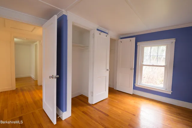 a view of livingroom with hardwood floor and hallway