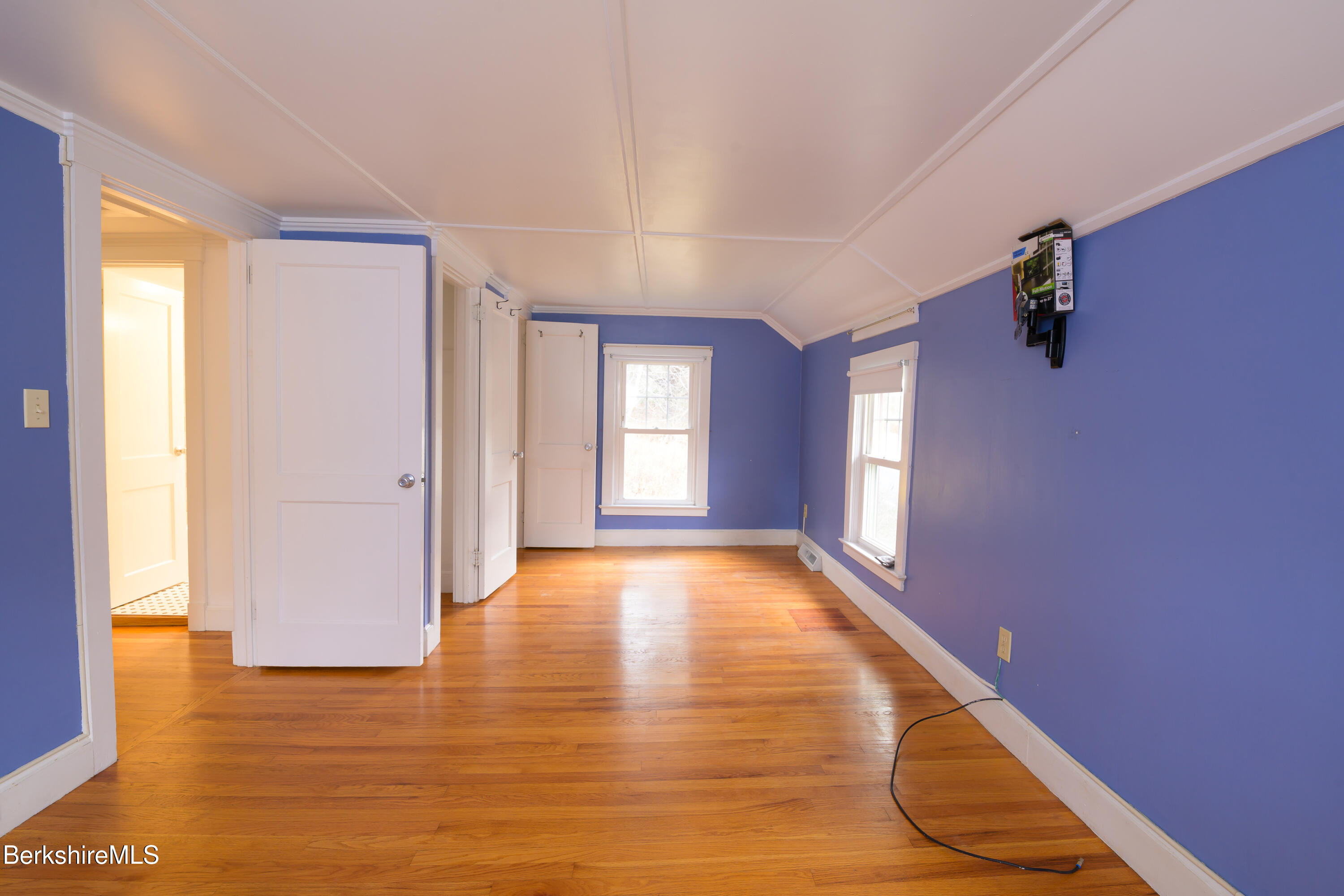 363 Henderson Road Williamstown, MA 01267 - Photo 17 of 24 a view of an empty room with glass door