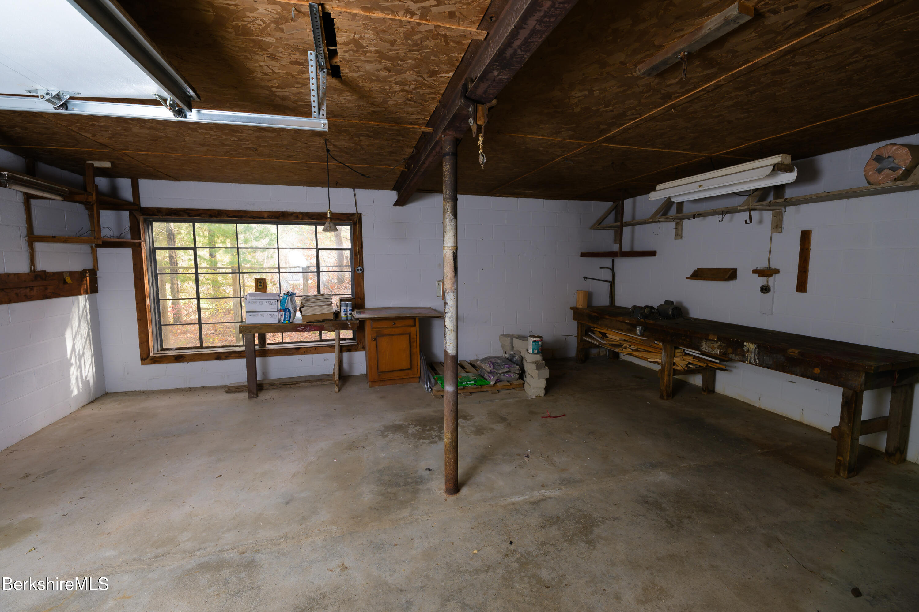 363 Henderson Road Williamstown, MA 01267 - Photo 6 of 24 a room with gym equipment and a table