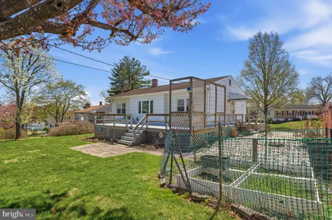 a view of a backyard with a patio