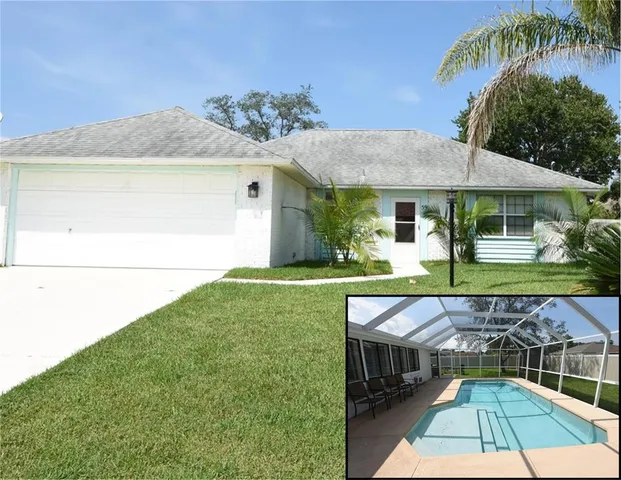 a view of house with swimming pool outdoor seating