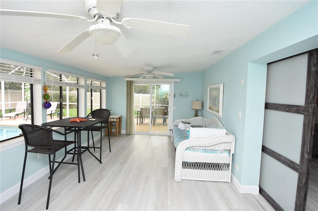 59 Fallen Oak Lane Palm Coast, FL 32137 - Photo 15 of 35 a view of a dining room with furniture window and wooden floor