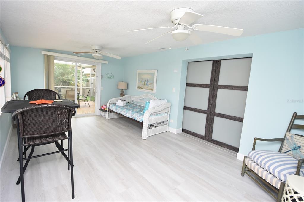 59 Fallen Oak Lane Palm Coast, FL 32137 - Photo 16 of 35 a living room with furniture and a window