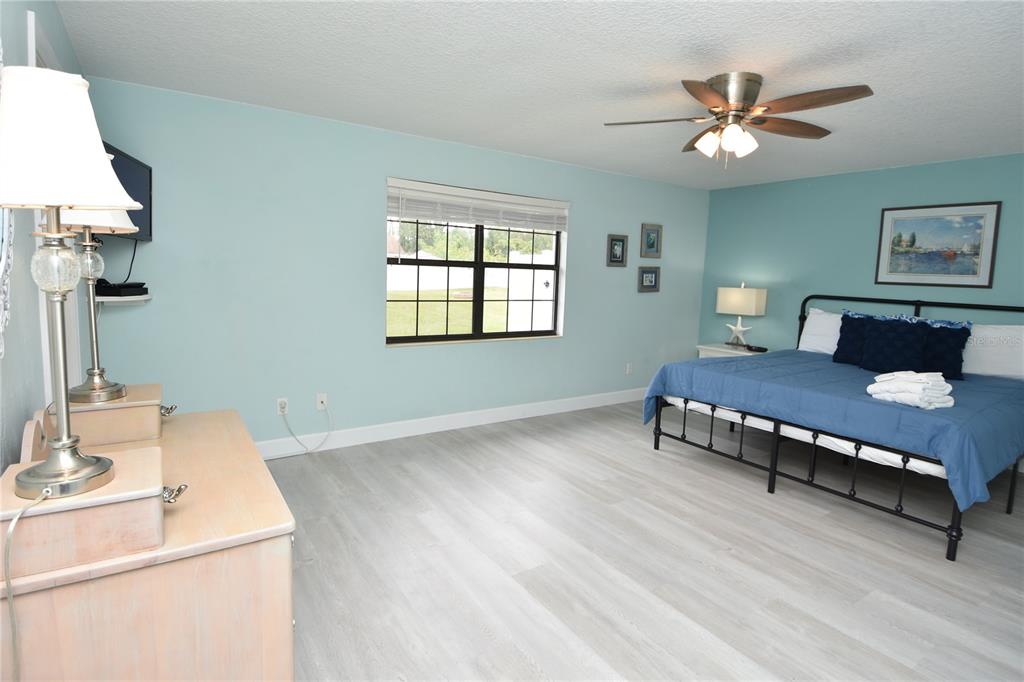59 Fallen Oak Lane Palm Coast, FL 32137 - Photo 19 of 35 a living room with furniture and a table