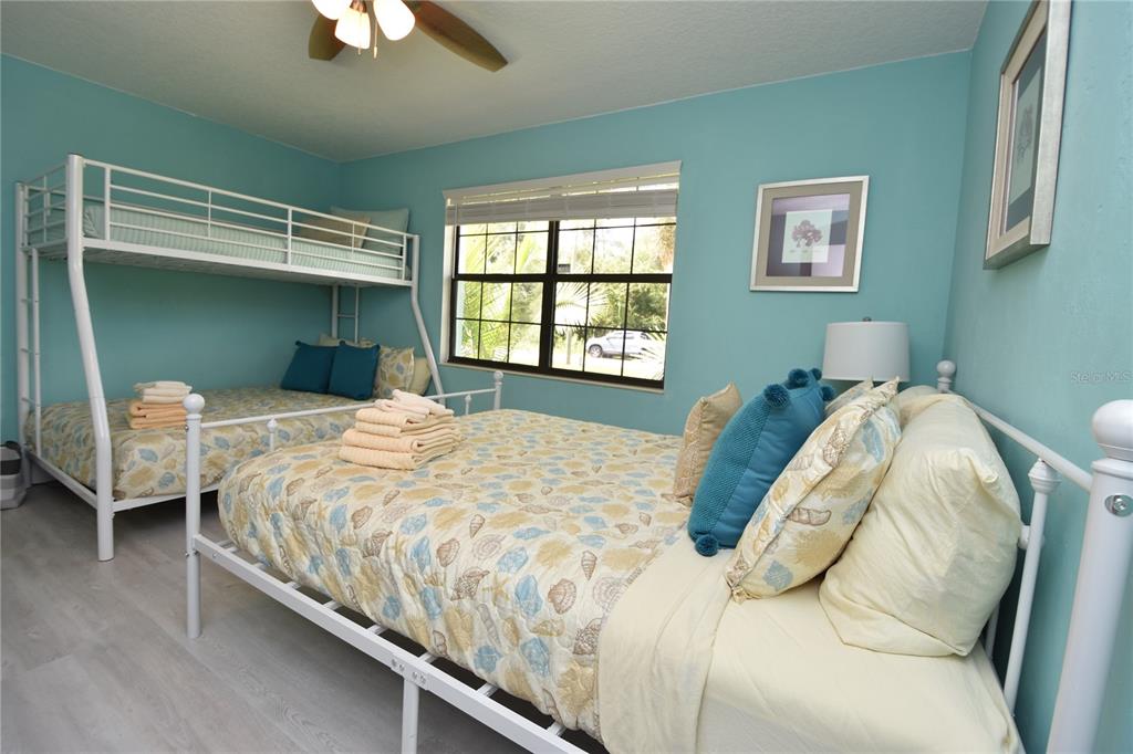 59 Fallen Oak Lane Palm Coast, FL 32137 - Photo 25 of 35 a bedroom with a bed and window