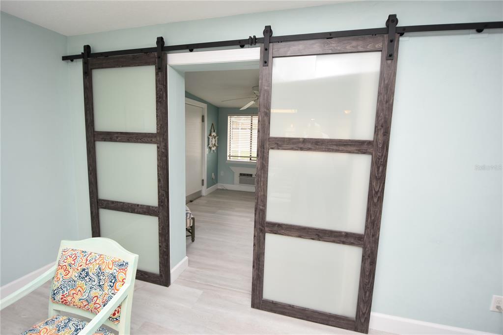 59 Fallen Oak Lane Palm Coast, FL 32137 - Photo 28 of 35 a view of walk in closet with empty racks