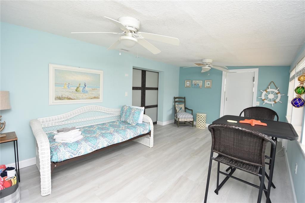 59 Fallen Oak Lane Palm Coast, FL 32137 - Photo 31 of 35 a living room with furniture and wooden floor
