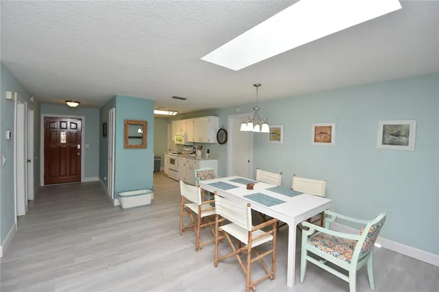 a view of a dining room with furniture