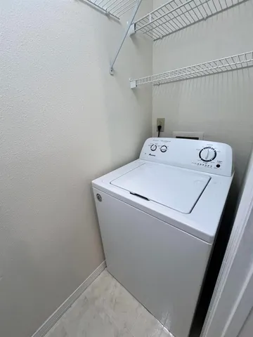 a kitchen with a refrigerator sink and stove