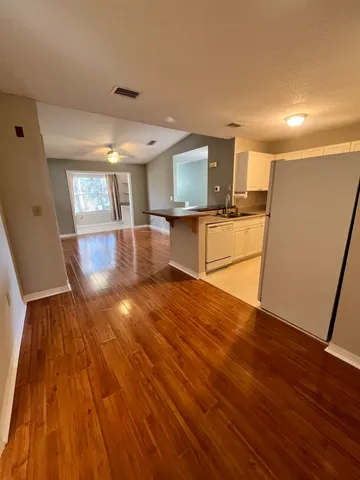 a view of a yard with a fountain