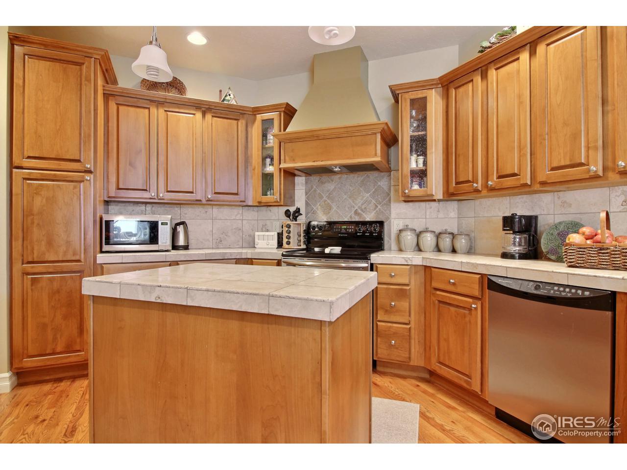 1305 Swainson Road Eaton, CO 80615 - Photo 13 of 40 Kitchen Island