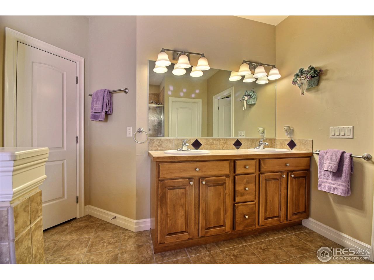 1305 Swainson Road Eaton, CO 80615 - Photo 19 of 40 Dual Sinks In Master Bathroom