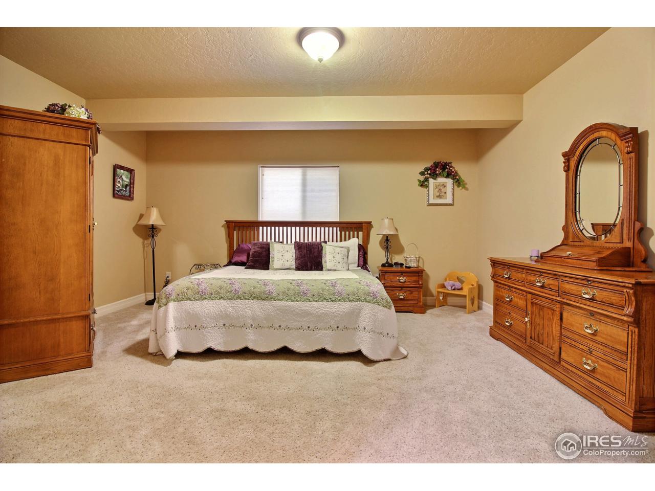 1305 Swainson Road Eaton, CO 80615 - Photo 35 of 40 Huge Guest Bedroom