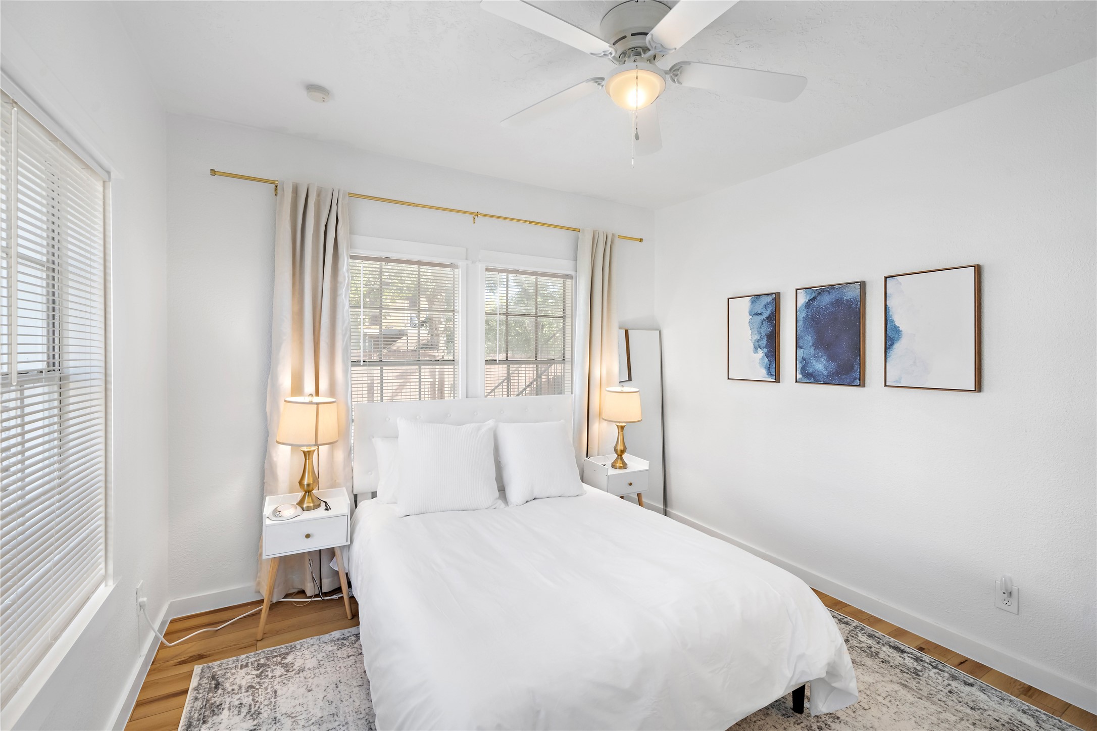 3901 Dallas Street, Unit B Houston, TX 77023 - Photo 12 of 32 a bedroom with a large bed and a window