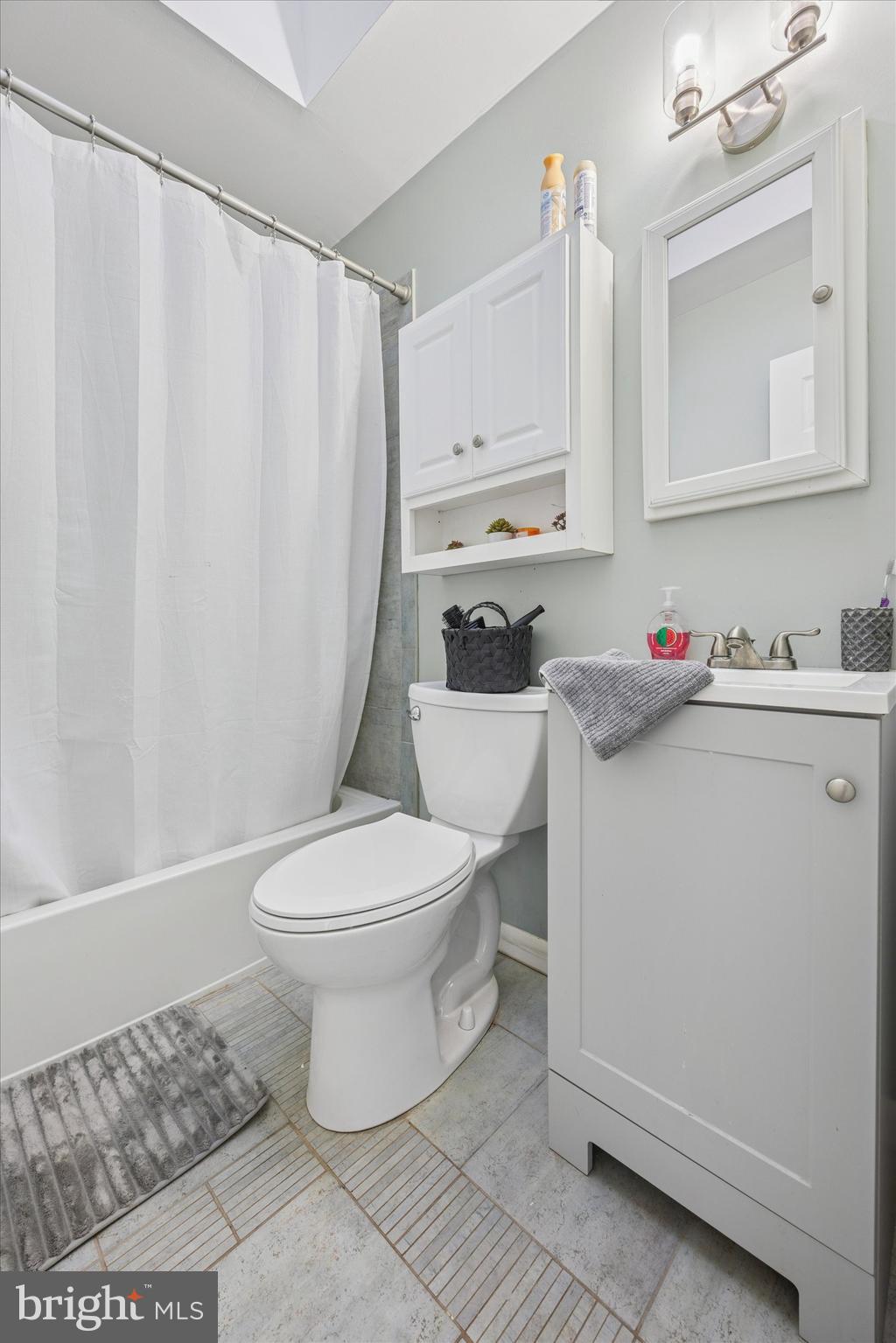 7011 Matthias Street Philadelphia, PA 19128 - Photo 16 of 28 a white toilet sitting next to a bathroom sink