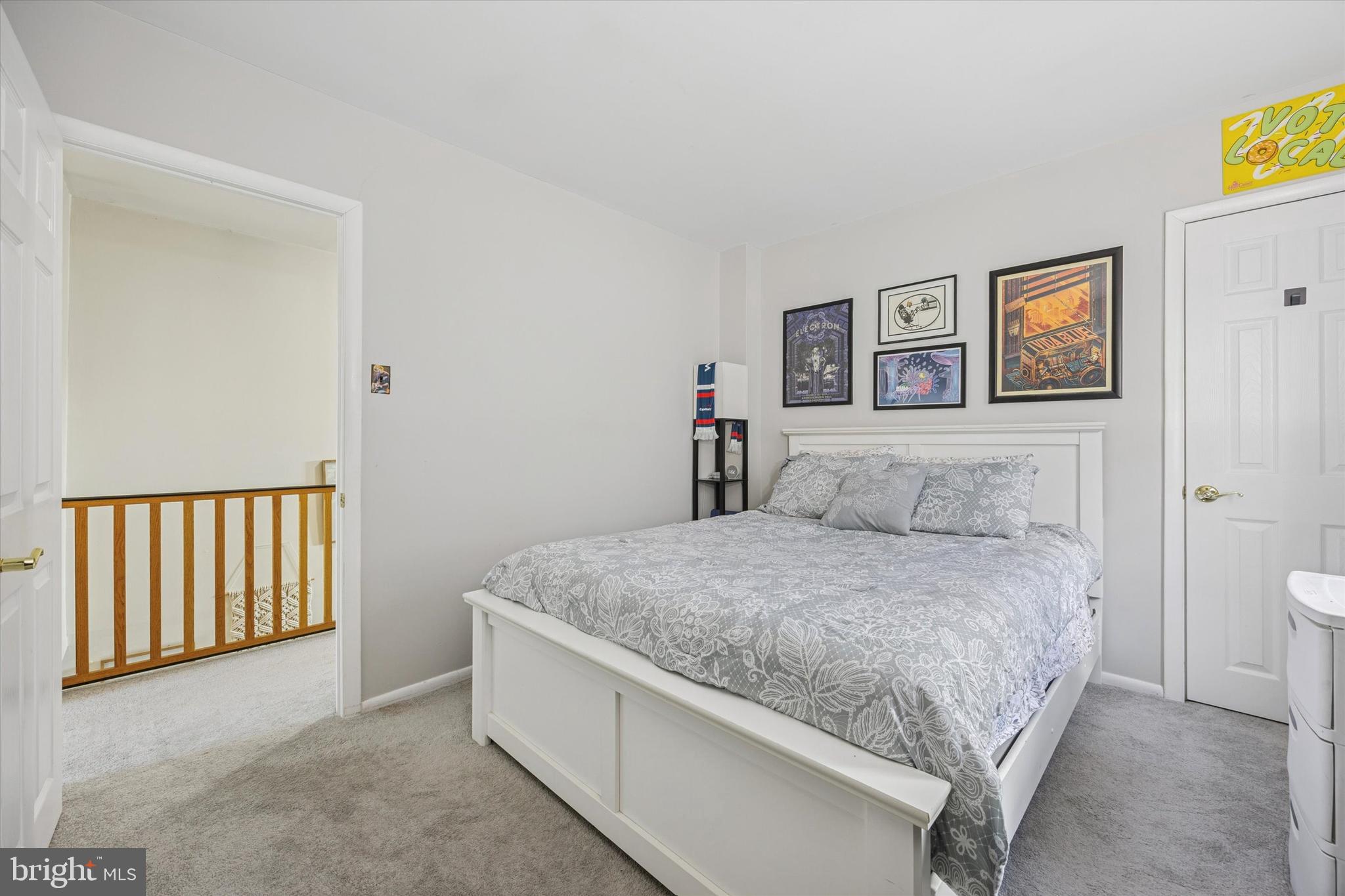 7011 Matthias Street Philadelphia, PA 19128 - Photo 18 of 28 a bedroom with a bed and painting on the wall