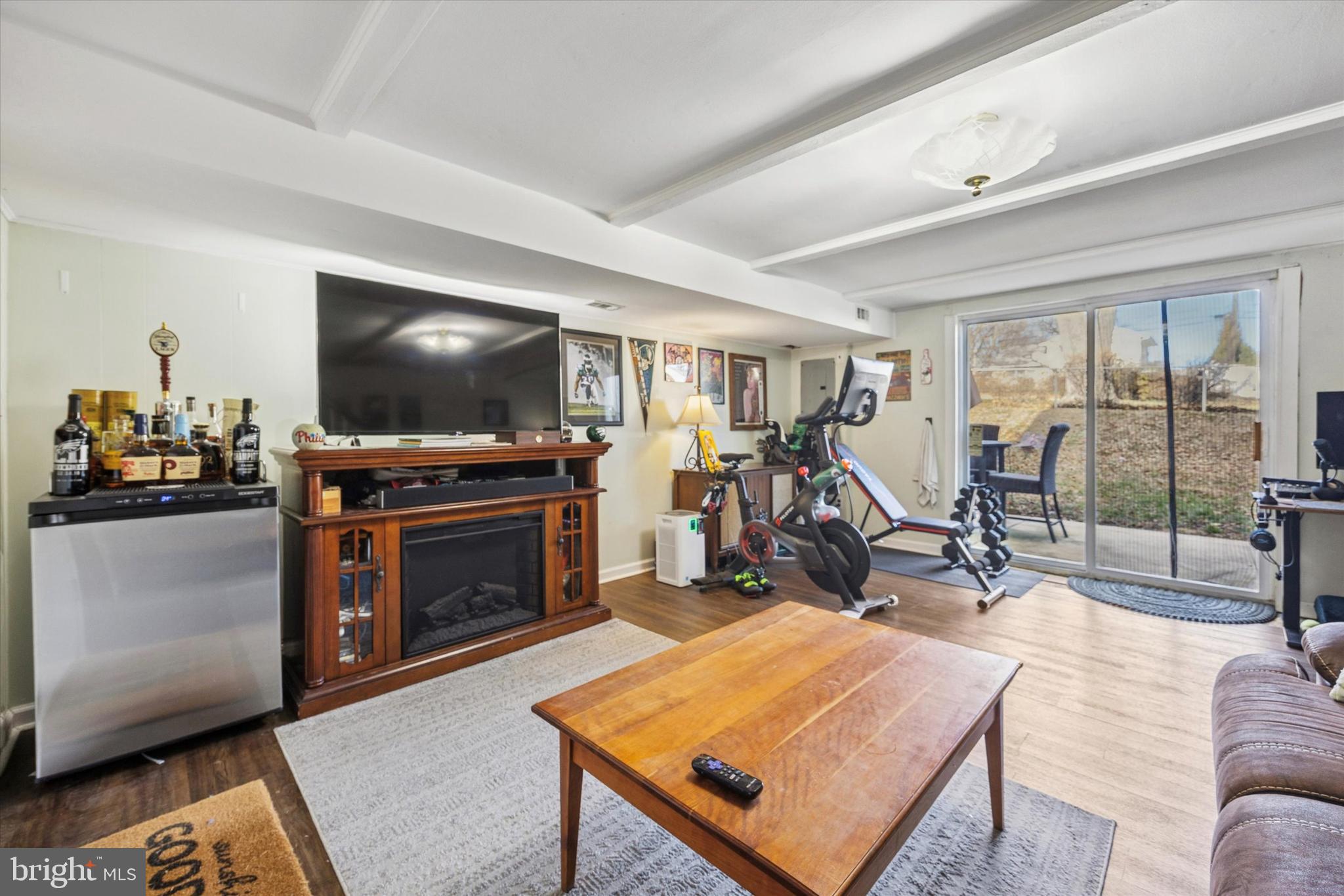 7011 Matthias Street Philadelphia, PA 19128 - Photo 22 of 28 a living room with furniture and a flat screen tv