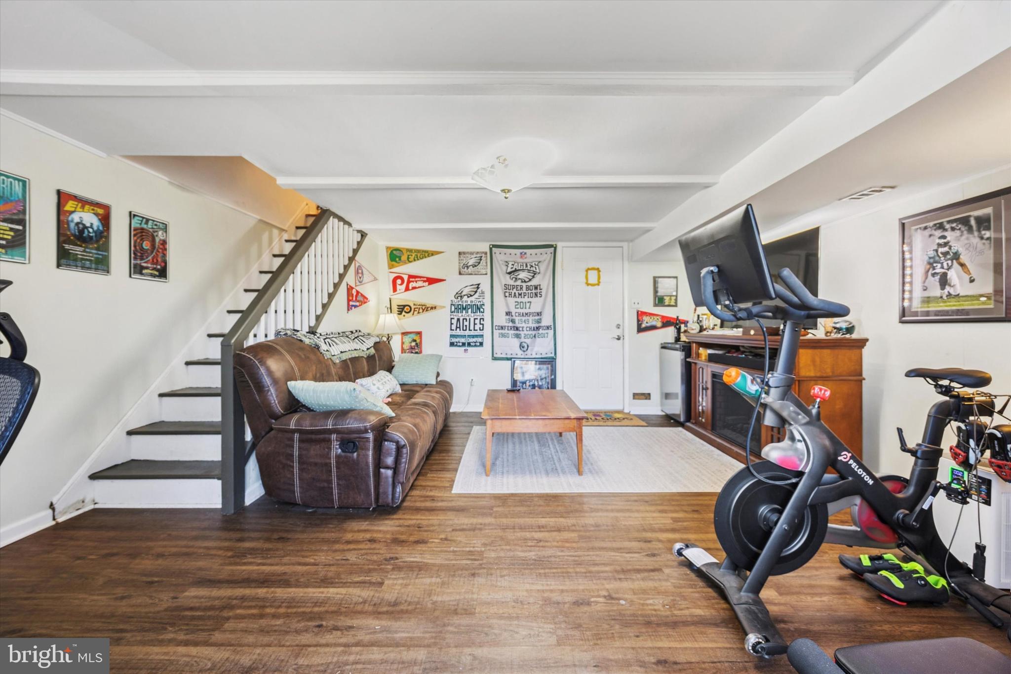 7011 Matthias Street Philadelphia, PA 19128 - Photo 23 of 28 a view of a livingroom with furniture and a gym cycle