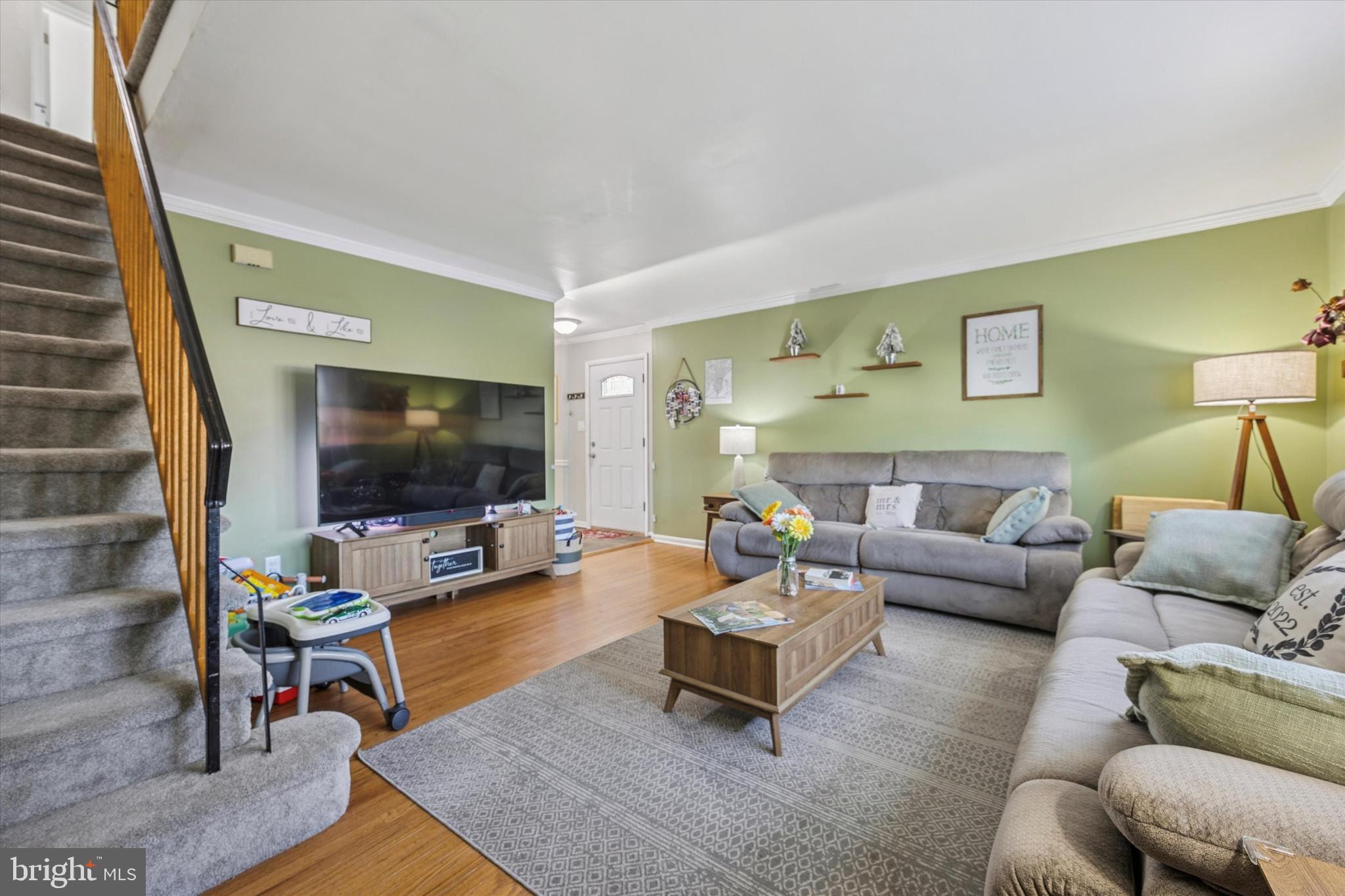 7011 Matthias Street Philadelphia, PA 19128 - Photo 3 of 28 a living room with furniture and a flat screen tv