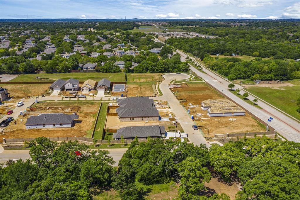 3344 Duncan Way Corinth, TX 76210 - Photo 30 of 38 Aerial view of a developing residential area with multiple properties under construction