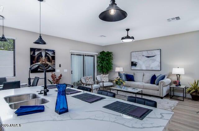 3832 East Monterey Way Phoenix, AZ 85018 - Photo 4 of 15 a living room with furniture and wooden floor