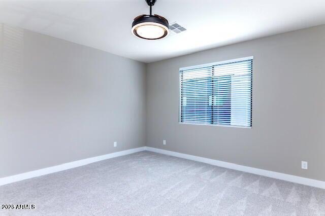 3832 East Monterey Way Phoenix, AZ 85018 - Photo 7 of 15 an empty room with a window