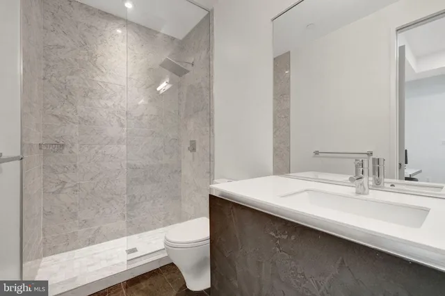 a outdoor living space with furniture and a rug