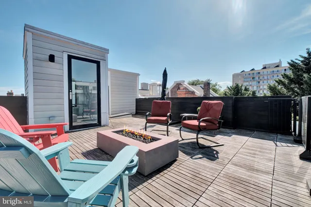 a view of a patio with swimming pool