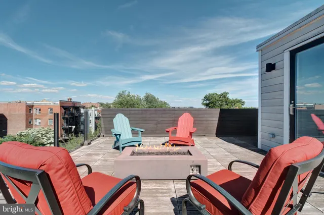 a couple of cars parked in front of buildings