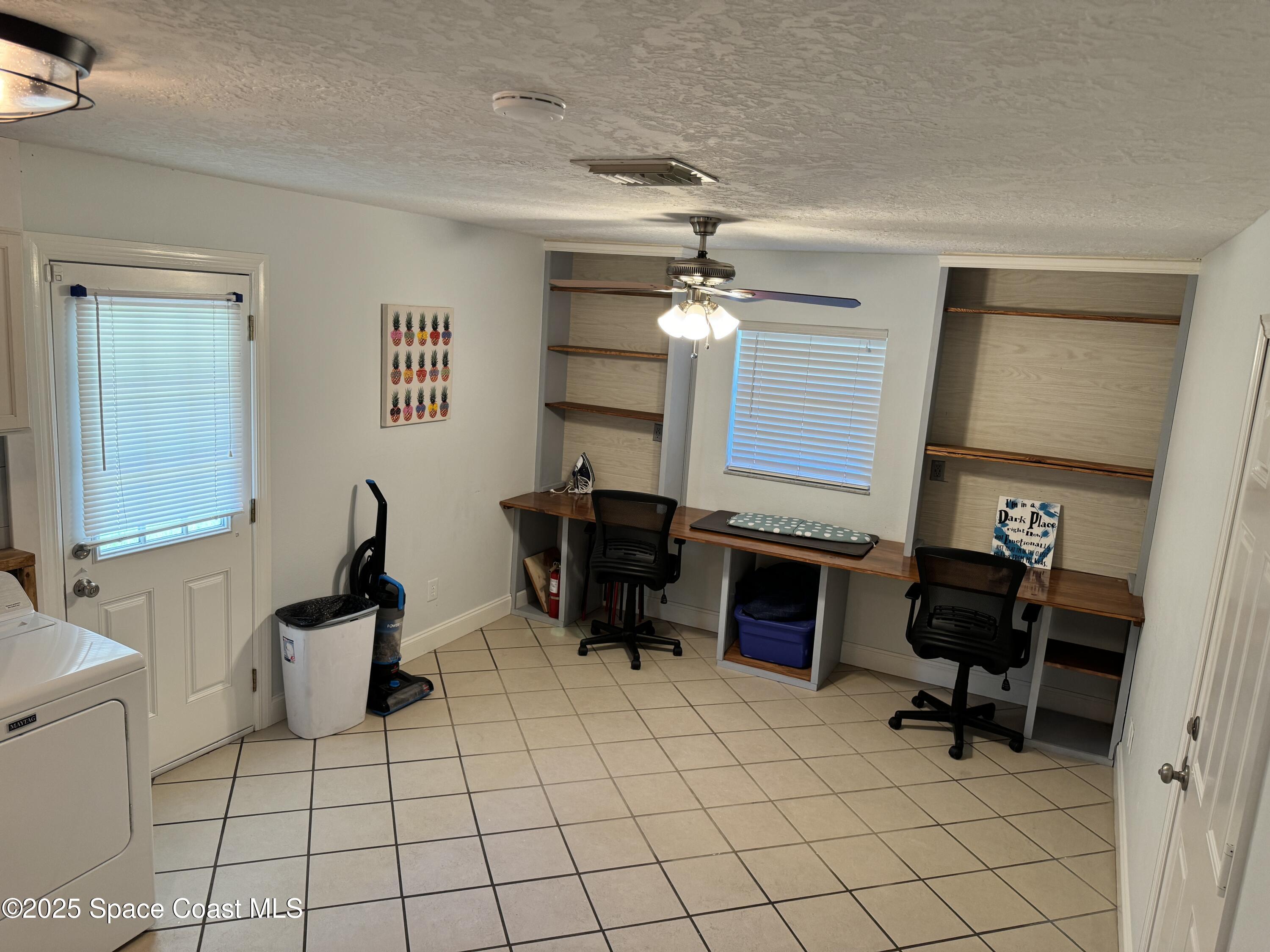2130 South Patrick Drive Indian Harbour Beach, FL 32937 - Photo 14 of 14 a living room with furniture