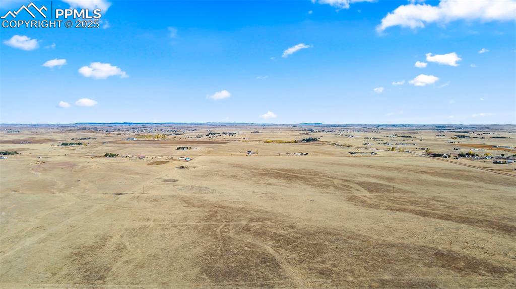 3920 North Log Road Peyton, CO 80831 - Photo 11 of 17 Aerial view of sparsely populated area with a desert landscape