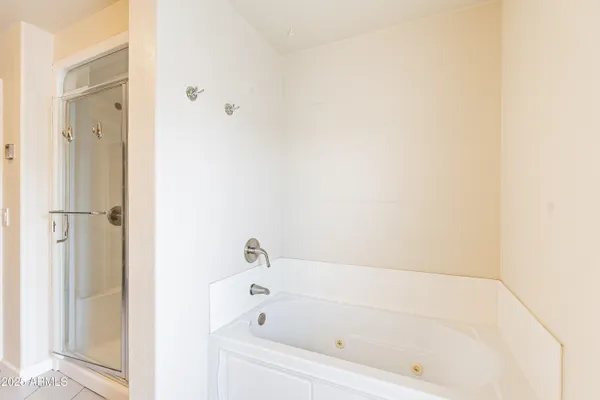 a bathroom with a double vanity sink mirror and toilet