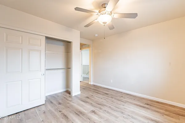 a bathroom with double vanity sinks a vanity and a mirror