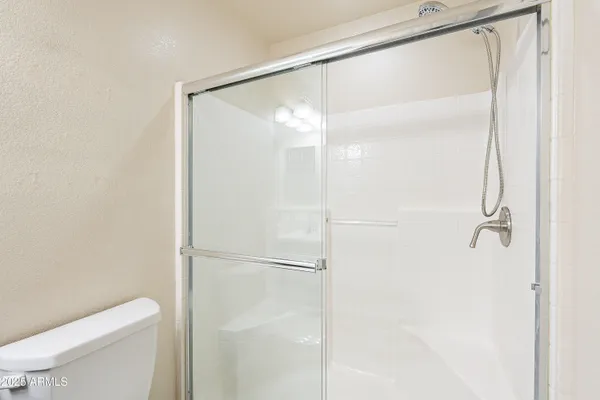 a bathroom with a bathtub and a sink
