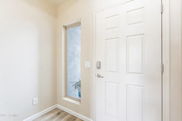 a view of a hallway with a white walls