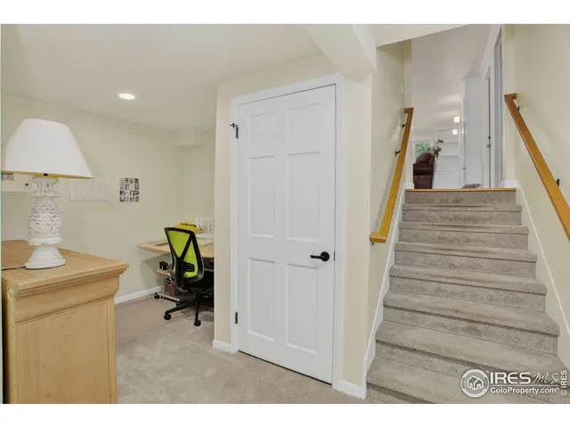 a bedroom with a bed and a cabinets