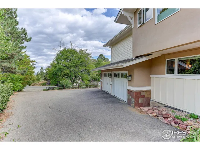 an aerial view of a house with a garden