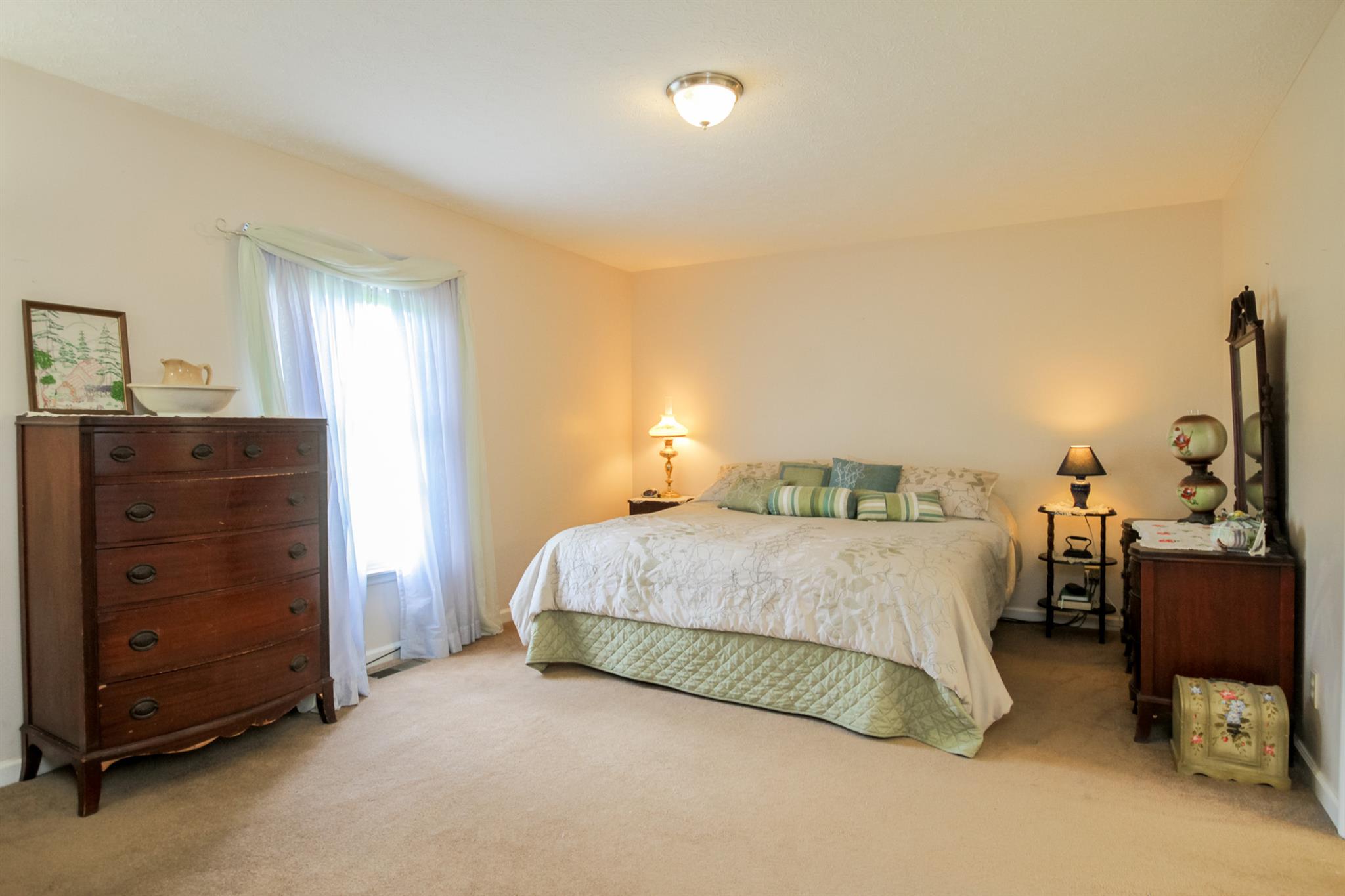 3902 Armstrong Road Springfield, TN 37172 - Photo 12 of 30 a bedroom with a bed and furniture